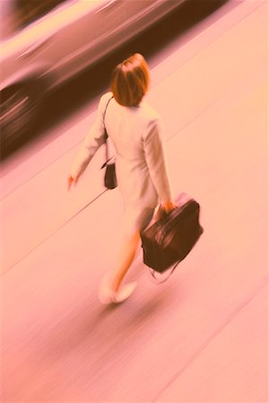 simsearch:700-00088263,k - Businesswoman Walking Outdoors Stock Photo - Rights-Managed, Code: 700-00037455
