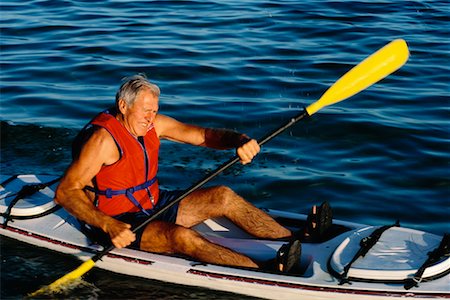 senior citizens kayaking - Mature Man Kayaking Stock Photo - Rights-Managed, Code: 700-00037689