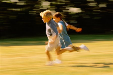 simsearch:700-00009893,k - Children Running Outdoors Stock Photo - Rights-Managed, Code: 700-00037777