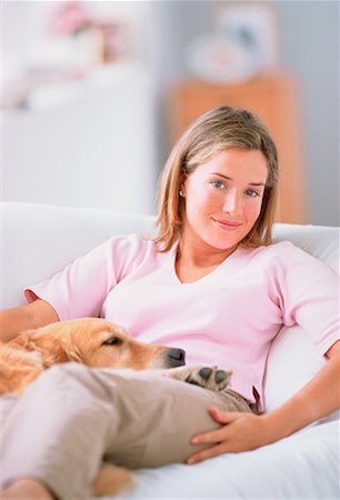 simsearch:700-00095769,k - Portrait of Woman Sitting on Sofa With Dog Stock Photo - Rights-Managed, Code: 700-00037835