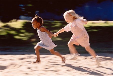 simsearch:700-00015310,k - Two Girls Running Outdoors Foto de stock - Con derechos protegidos, Código: 700-00038006
