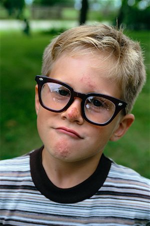 scratch (flesh wound) - Portrait of Boy with Scrapes on Face Stock Photo - Rights-Managed, Code: 700-00038021