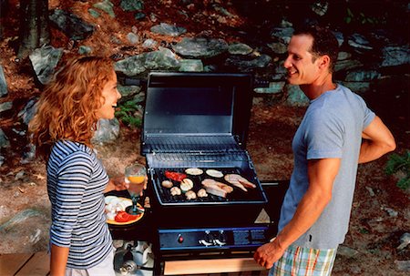 Couple cuire au barbecue Photographie de stock - Rights-Managed, Code: 700-00038311