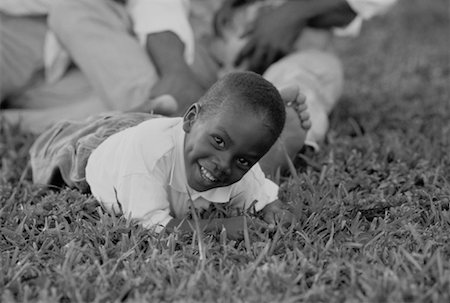Portrait of Boy Lying in Field Stock Photo - Rights-Managed, Code: 700-00038834