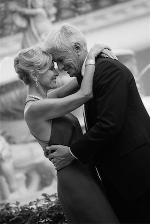 Mature Couple in Formal Wear Embracing Stock Photo - Rights-Managed, Code: 700-00038831