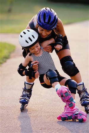 rollerblade girl - Mother and Daughter In-Line Skating Stock Photo - Rights-Managed, Code: 700-00038907