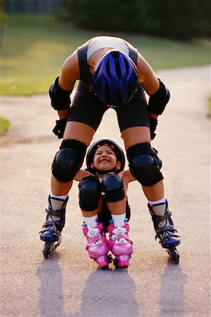 rollerblade girl - Mother and Daughter In-Line Skating Stock Photo - Rights-Managed, Code: 700-00038908