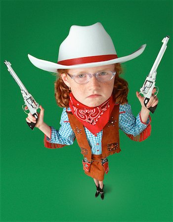 Girl in Cowgirl Costume Foto de stock - Con derechos protegidos, Código: 700-00038943