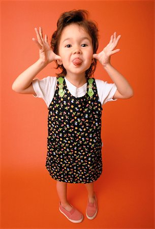 Portrait of Girl Sticking Tongue Out Stock Photo - Rights-Managed, Code: 700-00038977