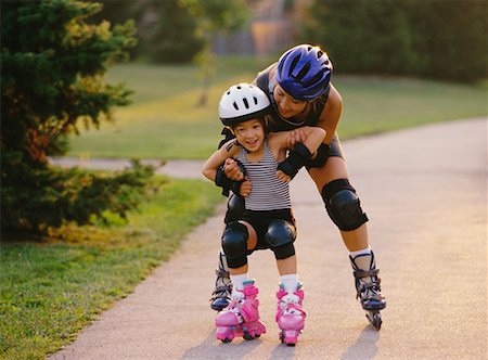 rollerblade girl - Mother and Daughter In-Line Skating Stock Photo - Rights-Managed, Code: 700-00039355