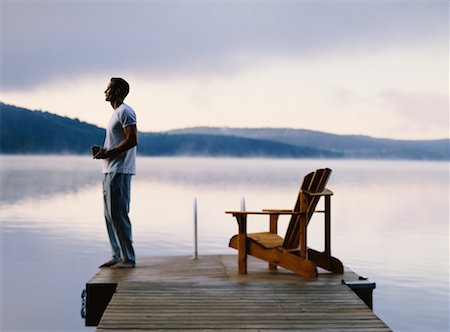 Man Standing on Dock Stock Photo - Rights-Managed, Code: 700-00039410