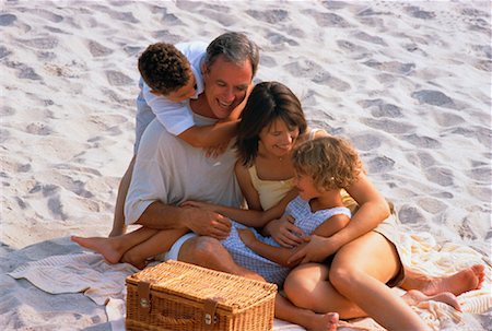 summertime picnic with family in the beach - Family on Beach Stock Photo - Rights-Managed, Code: 700-00039615