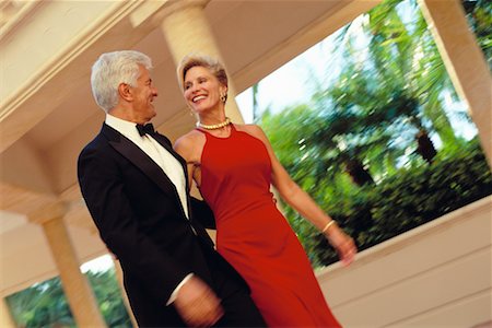 Mature Couple in Formal Wear Walking Outdoors Stock Photo - Rights-Managed, Code: 700-00039820