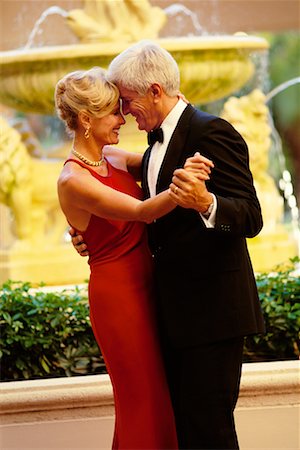 Mature Couple in Formal Wear Dancing Outdoors Stock Photo - Rights-Managed, Code: 700-00039932