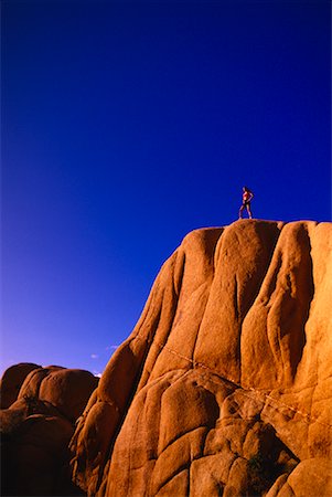 Woman Standing on Side of Cliff Foto de stock - Con derechos protegidos, Código: 700-00030204
