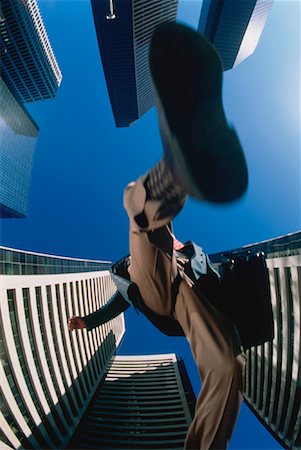 simsearch:700-00039942,k - Looking Up at Businessman Running Outdoors Stock Photo - Rights-Managed, Code: 700-00030438