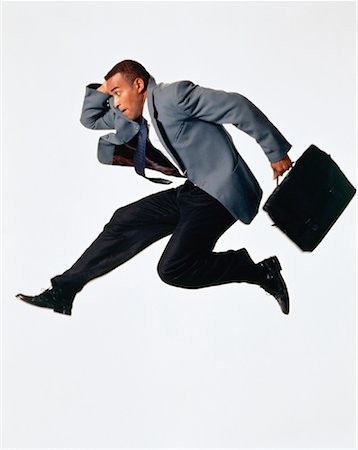 Businessman Hurdling Stock Photo - Rights-Managed, Code: 700-00030478