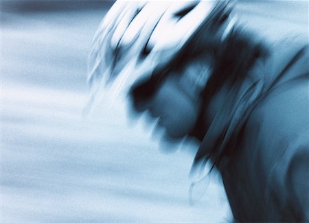 Blurred View of Man Wearing Helmet Stock Photo - Rights-Managed, Code: 700-00030886