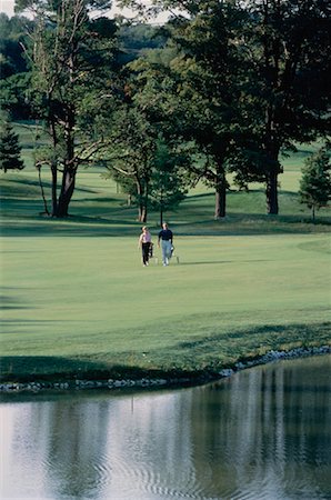 richmond hill - Mature Couple Golfing Richmond Hill, Ontario, Canada Foto de stock - Direito Controlado, Número: 700-00031166