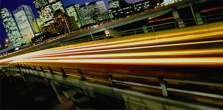 road panoramic blurred - Light Trails Through City at Night Stock Photo - Rights-Managed, Code: 700-00031488