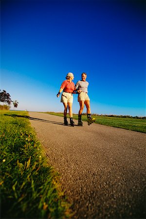 Mature Couple In-Line Skating Stock Photo - Rights-Managed, Code: 700-00031956