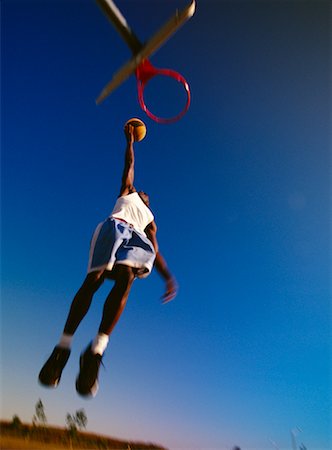 simsearch:632-06317515,k - Man Playing Basketball Outdoors Stock Photo - Rights-Managed, Code: 700-00032212