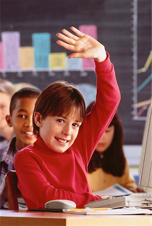 raise hand classroom eager - Portrait of Boy with Hand Raised In Classroom Stock Photo - Rights-Managed, Code: 700-00032346