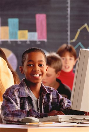 Portrait of Boy at Computer in Classroom Stock Photo - Rights-Managed, Code: 700-00032343