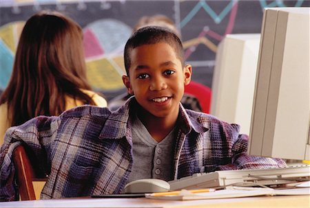 Portrait of Boy Using Computer In Classroom Stock Photo - Rights-Managed, Code: 700-00032588