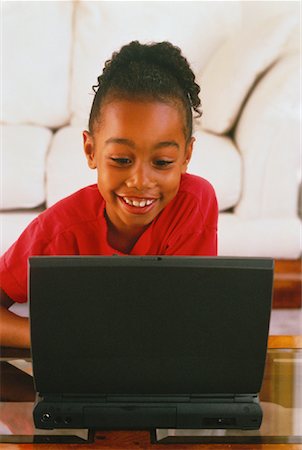 peter griffith - Girl Using Laptop Computer Stock Photo - Rights-Managed, Code: 700-00032607