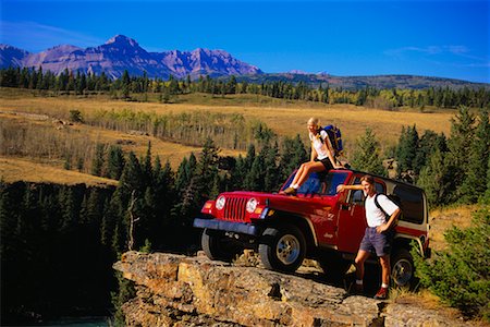 Couple with Jeep, Kananaskis Country, Alberta, Canada Stock Photo - Rights-Managed, Code: 700-00032600