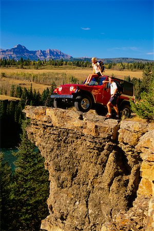 Couple with Jeep, Kananaskis Country, Alberta, Canada Stock Photo - Rights-Managed, Code: 700-00032601