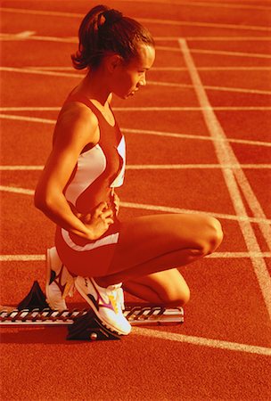 simsearch:700-00032605,k - Weibliche Läufer auf Startblöcke Stockbilder - Lizenzpflichtiges, Bildnummer: 700-00032758
