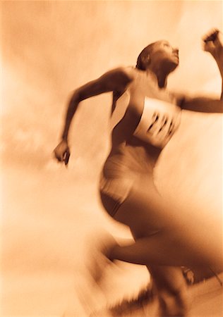simsearch:700-00033315,k - Verschwommene Sicht auf weibliche Läufer Stockbilder - Lizenzpflichtiges, Bildnummer: 700-00032818