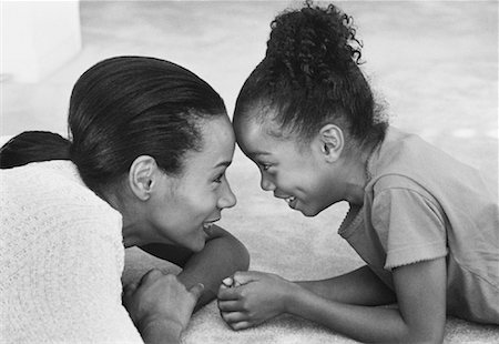 Mother and Daughter Face to Face Foto de stock - Con derechos protegidos, Código: 700-00033061