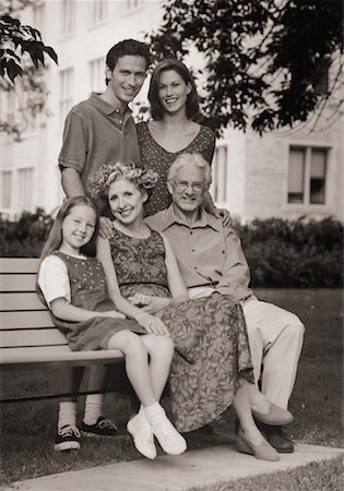 Portrait of Family on Bench in Park Stock Photo - Rights-Managed, Code: 700-00033124