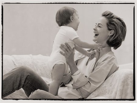 Mother and Toddler on Sofa Stock Photo - Rights-Managed, Code: 700-00033412