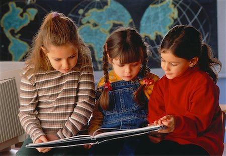 simsearch:700-00014462,k - Three Girls Reading in Classroom Stock Photo - Rights-Managed, Code: 700-00033998