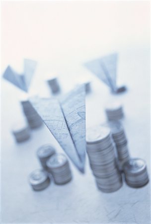 pilz (pflanze) - Paper Airplanes Flying Over Stacks of Coins Stock Photo - Rights-Managed, Code: 700-00045039