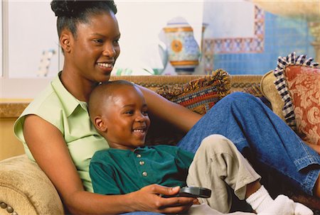 Mother and Son Watching Television on Sofa Stock Photo - Rights-Managed, Code: 700-00045301