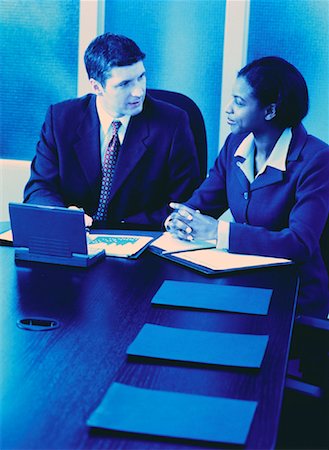 simsearch:700-00367646,k - Businessman and Businesswoman in Meeting Stock Photo - Rights-Managed, Code: 700-00045402