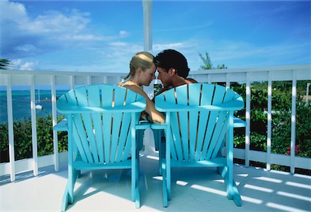 simsearch:873-06440388,k - Vue arrière du Couple assis sur des chaises sur le balcon Photographie de stock - Rights-Managed, Code: 700-00045647