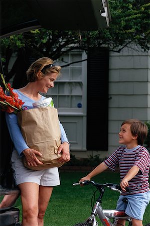 simsearch:700-00350275,k - Mother Holding Grocery Bag and Son on Bike Stock Photo - Rights-Managed, Code: 700-00045660