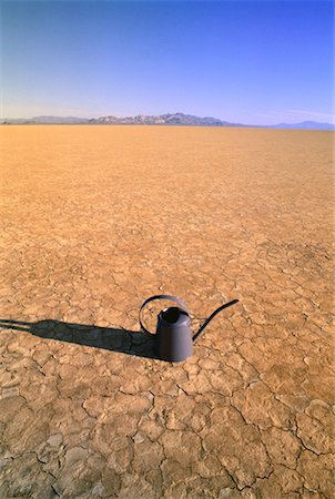 soluzione temporanea - Watering Can in Desert Nevada, USA Fotografie stock - Rights-Managed, Codice: 700-00045972