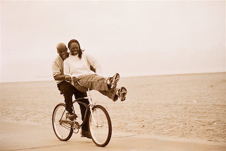 Couple Riding Bicycle on Beach Stock Photo - Rights-Managed, Code: 700-00046184