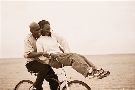 Couple Riding Bicycle on Beach Stock Photo - Rights-Managed, Code: 700-00046185