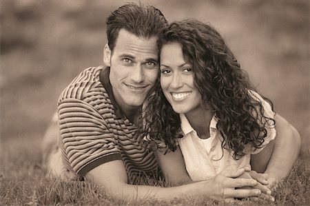 simsearch:700-00046307,k - Portrait of Couple Lying in Field Stock Photo - Rights-Managed, Code: 700-00046416