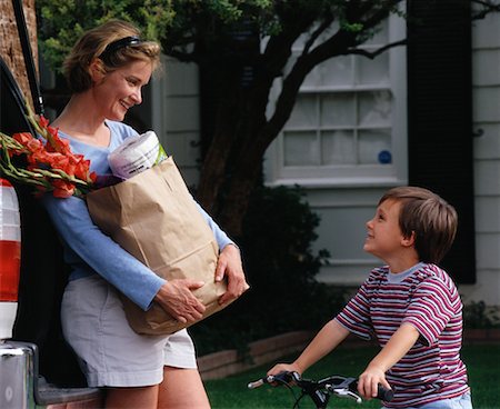 simsearch:700-00350275,k - Mother Holding Groceries Talking To Son Outdoors Stock Photo - Rights-Managed, Code: 700-00046451