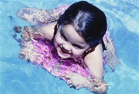 simsearch:700-00091319,k - Girl in Swimming Pool Foto de stock - Con derechos protegidos, Código: 700-00046959