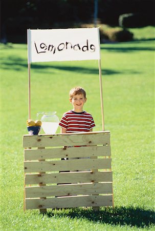 sell lemonade - Boy with Lemonade Stand in Field Stock Photo - Rights-Managed, Code: 700-00047052
